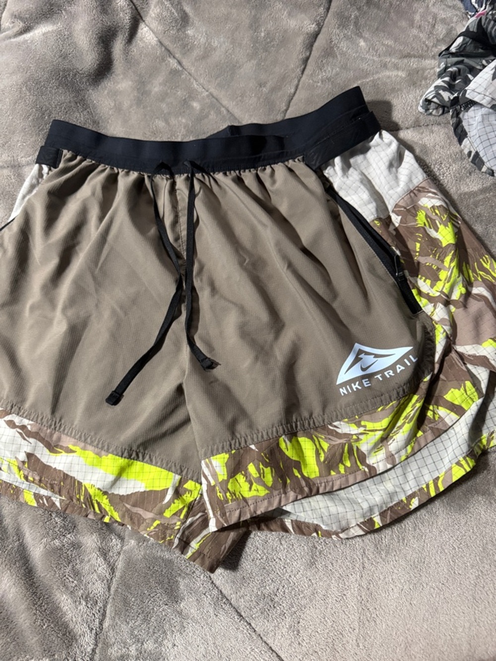 Nike Trail Olive Green Athletic Running Shorts with Neon Accents